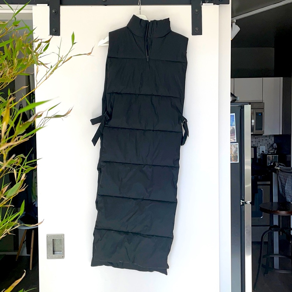 Cape down jacket